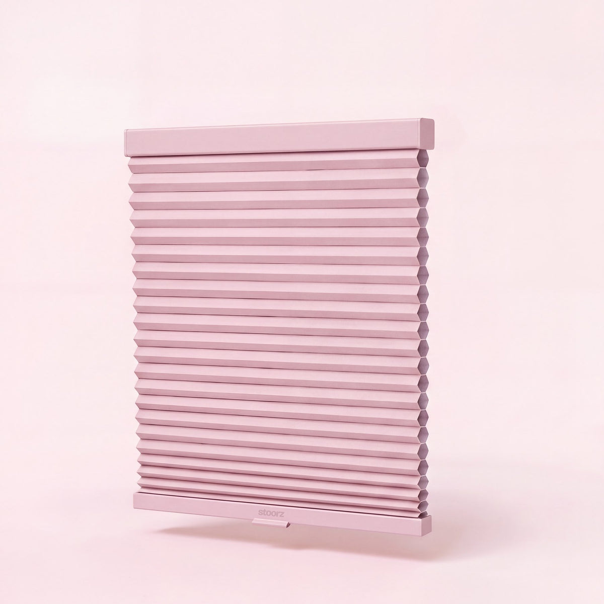 Stoorz blind with its aluminium rail and adhesive strip, its pleated fabric and its bottom bar with clip-on handle